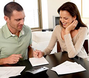 Couple go over thier health plan. - Copyright – Stock Photo / Register Mark